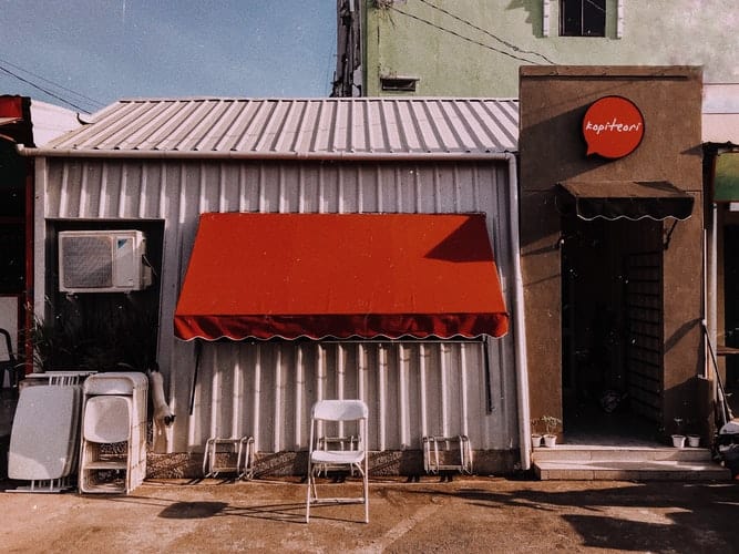 Clean red awnings fabric installed in a closed restaurant