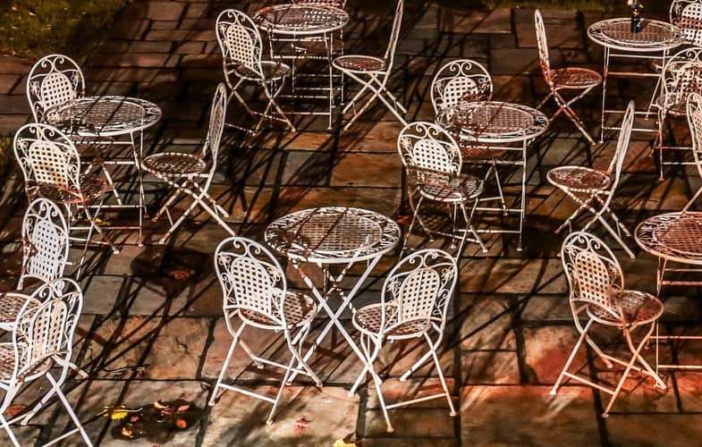 Drying out clean wrought iron patio furniture in the sun