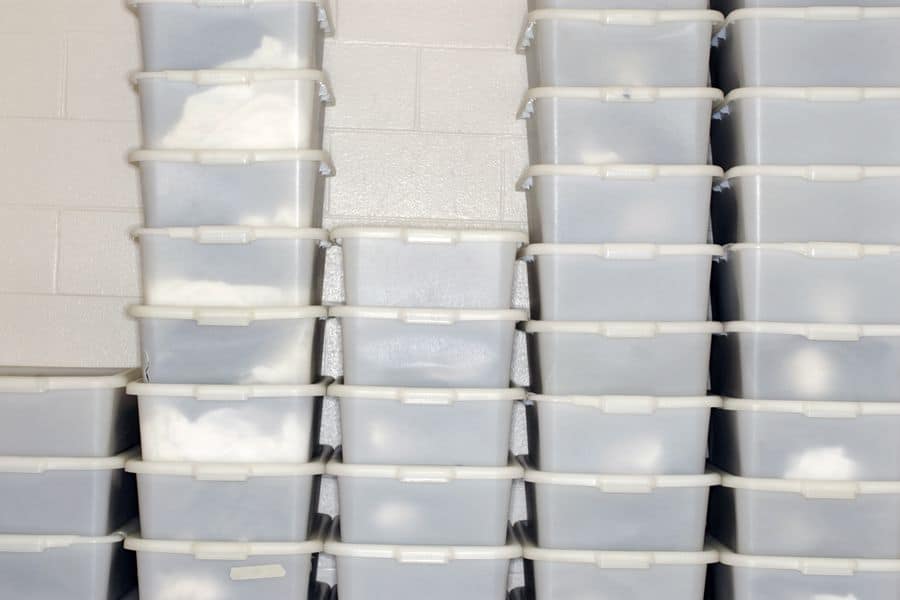 Stacks of cloudy plastic containers