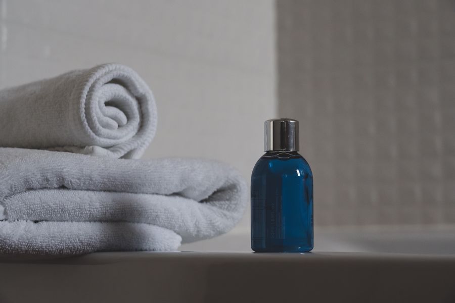 Towel and a bottle of cleanser