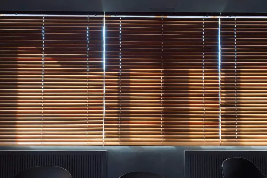 Wood blinds blocking the sunlight