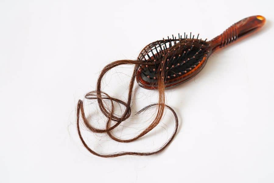 Hairbrush with a lock of hair