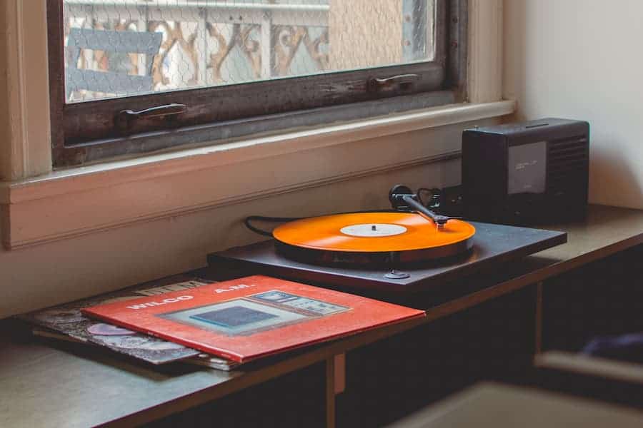 Gray turntable and vinyl records