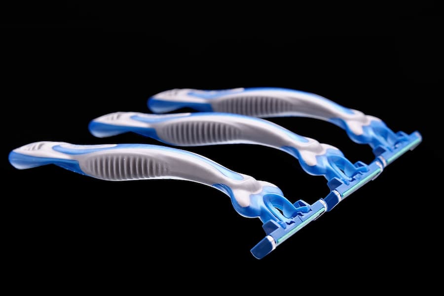 Three safety razors in blue and white color