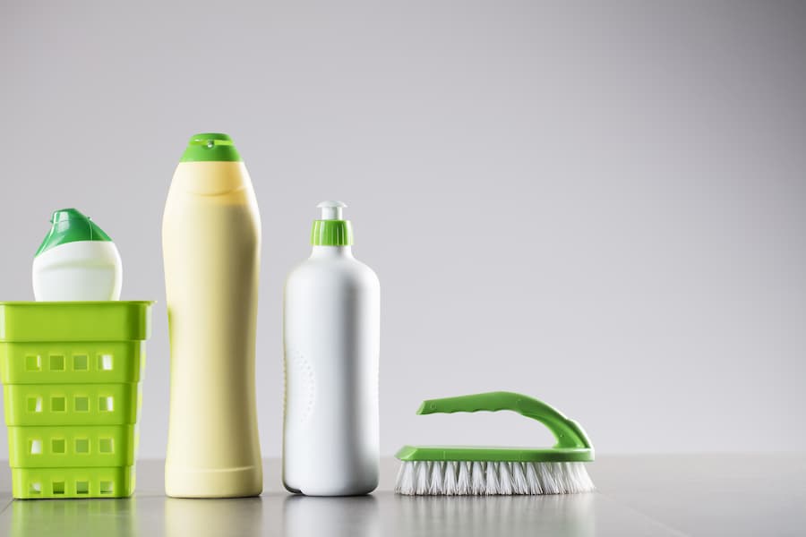 Tray, plastic container and a brush.