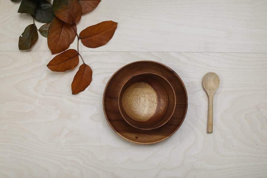 Wooden salad bowl with spoon