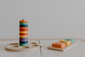 Colorful wooden toys on table