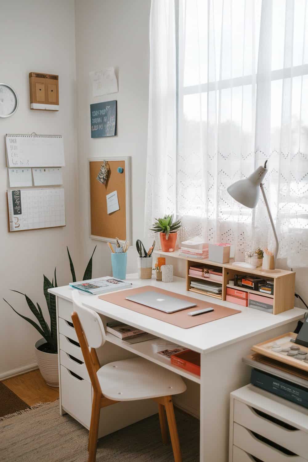 A well-organized desk with a laptop, stationery, and plants, showcasing efficient use of space.