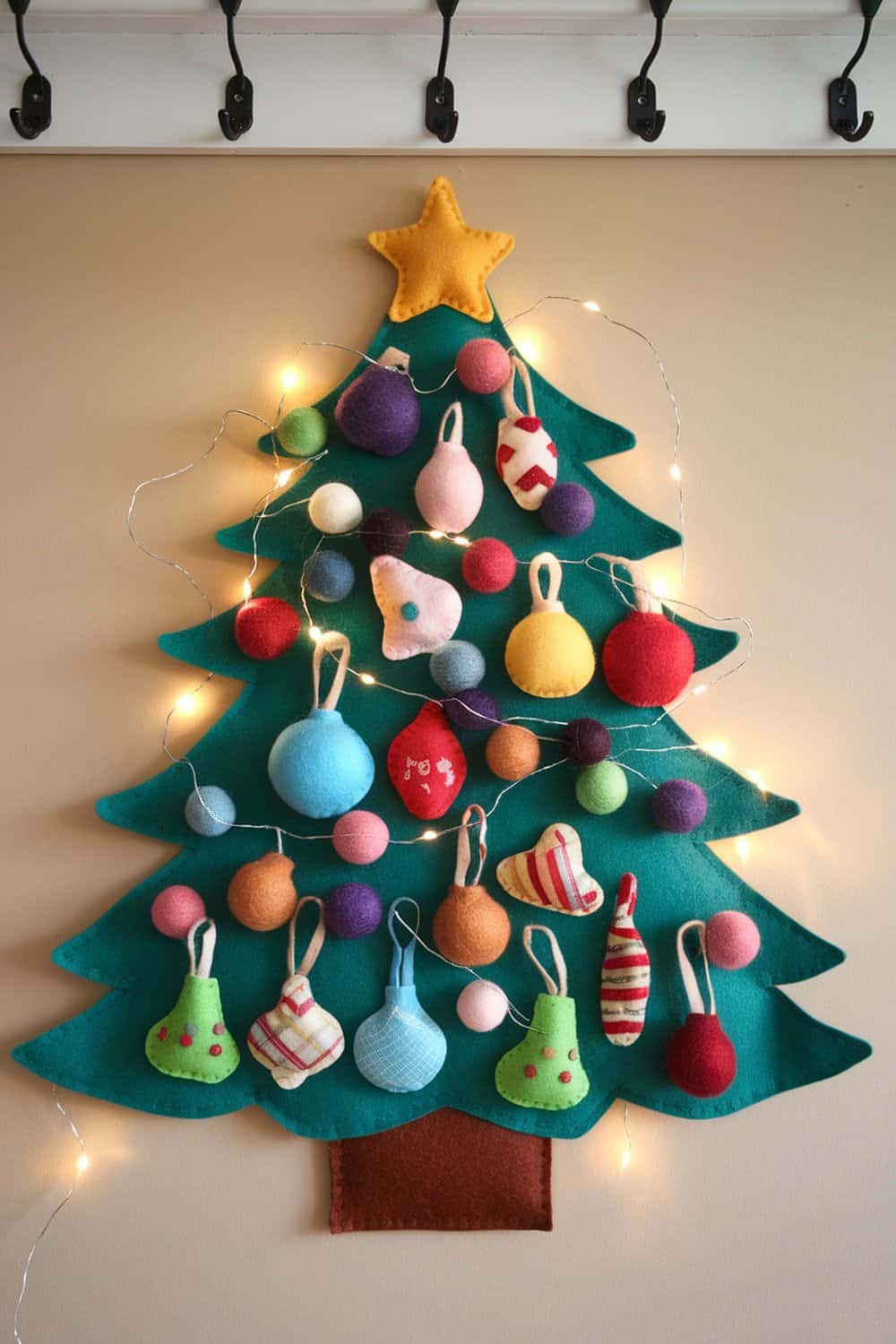 Felt Christmas tree wall hanging with colorful ornaments and lights